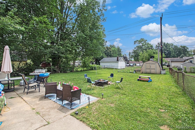 34919 Glover, Wayne, MI 48184 - fenced backyard with an outdoor fire pit, a patio area, and a shed