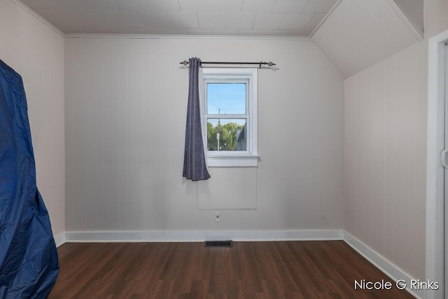 911 Baldwin St SE, Grand Rapids, MI 49506 - bonus room with dark wood-style flooring and baseboards