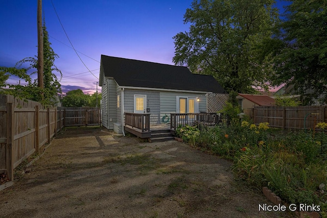 911 Baldwin St SE, Grand Rapids, MI 49506 - back of house featuring a wooden deck and a fenced backyard