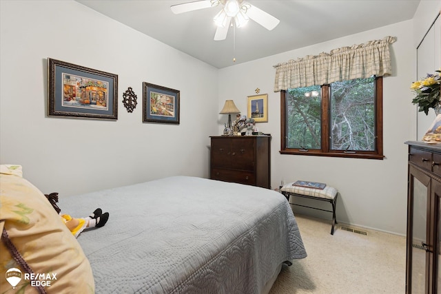 11206 E Atherton Rd, Davison, MI 48423 - bedroom with light colored carpet and a ceiling fan