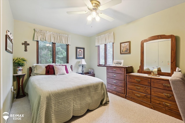 11206 E Atherton Rd, Davison, MI 48423 - carpeted bedroom featuring multiple windows and a ceiling fan