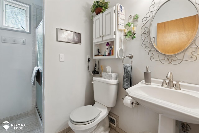 11206 E Atherton Rd, Davison, MI 48423 - full bath with toilet and a stall shower