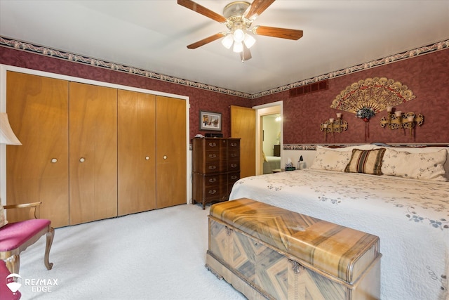 11206 E Atherton Rd, Davison, MI 48423 - bedroom featuring wallpapered walls, light carpet, a closet, and a ceiling fan