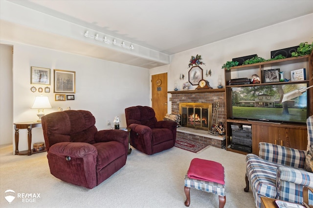 11206 E Atherton Rd, Davison, MI 48423 - carpeted living area with a fireplace