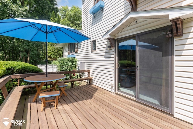 11206 E Atherton Rd, Davison, MI 48423 - deck featuring view of wooded area