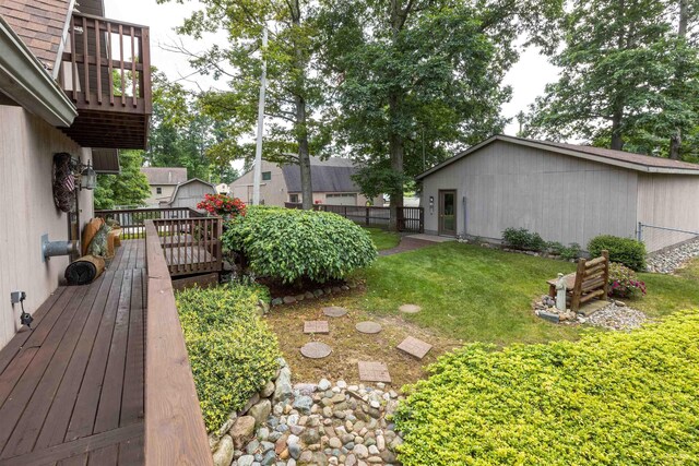 5370 N Lake Sanford Rd, Sanford, MI 48657 - view of yard featuring a wooden deck