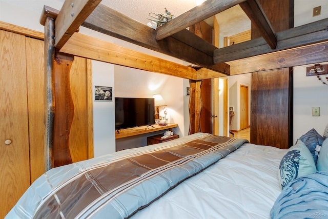 5370 N Lake Sanford Rd, Sanford, MI 48657 - bedroom with beam ceiling