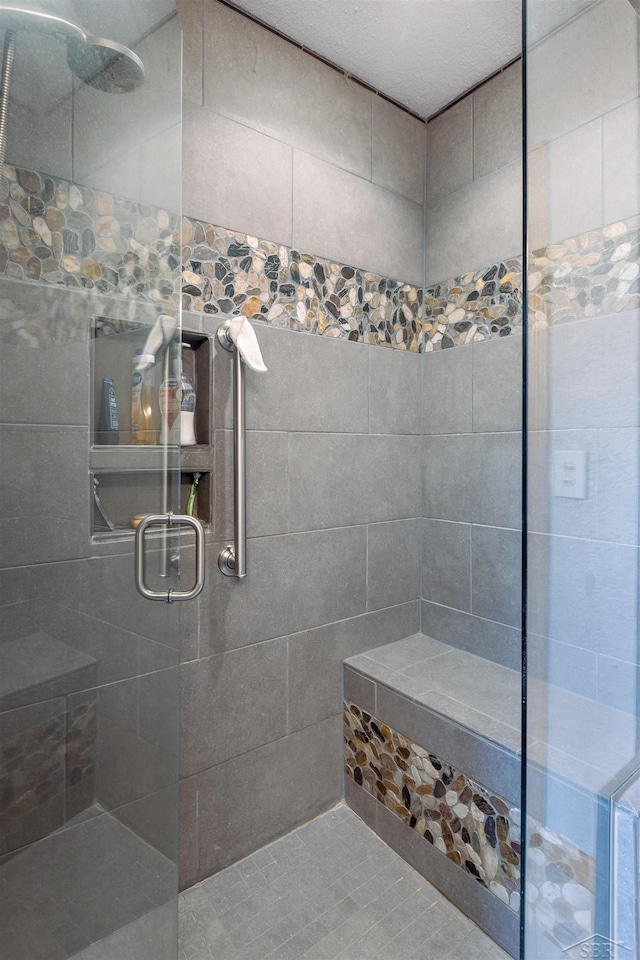 5370 N Lake Sanford Rd, Sanford, MI 48657 - bathroom featuring a tile shower