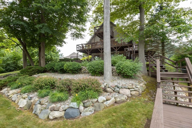 5370 N Lake Sanford Rd, Sanford, MI 48657 - view of yard featuring stairs and a deck