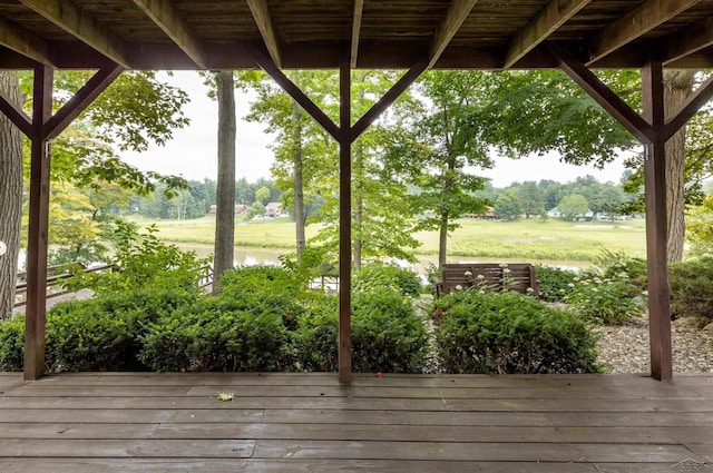 5370 N Lake Sanford Rd, Sanford, MI 48657 - wooden terrace with view of wooded area