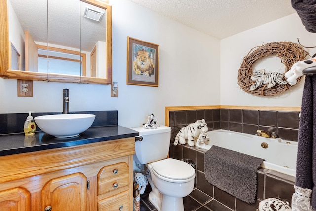 5370 N Lake Sanford Rd, Sanford, MI 48657 - full bathroom featuring a textured ceiling, a bath, vanity, and tile patterned flooring