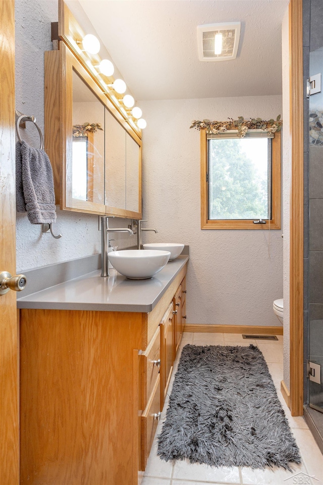 5370 N Lake Sanford Rd, Sanford, MI 48657 - full bath with vanity and a shower with shower door