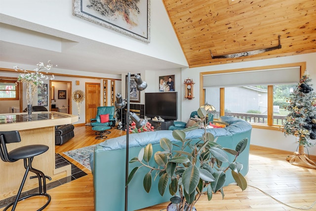 5370 N Lake Sanford Rd, Sanford, MI 48657 - living room featuring plenty of natural light, wooden ceiling, wood finished floors, and high vaulted ceiling