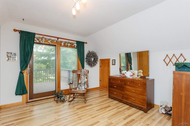 5370 N Lake Sanford Rd, Sanford, MI 48657 - sitting room featuring vaulted ceiling and wood finished floors