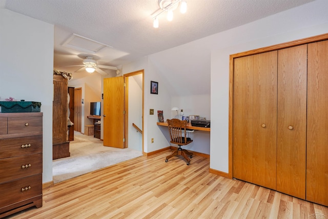 5370 N Lake Sanford Rd, Sanford, MI 48657 - office space with wood finished floors, a textured ceiling, and vaulted ceiling