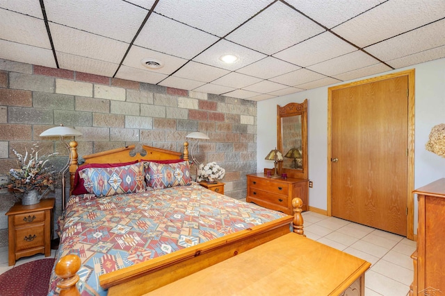 5370 N Lake Sanford Rd, Sanford, MI 48657 - bedroom featuring a paneled ceiling and tile patterned floors