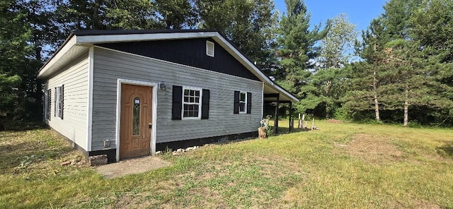 4997 S Croton Hardy Dr, Newaygo, MI 49337 - view of front of home featuring a front lawn