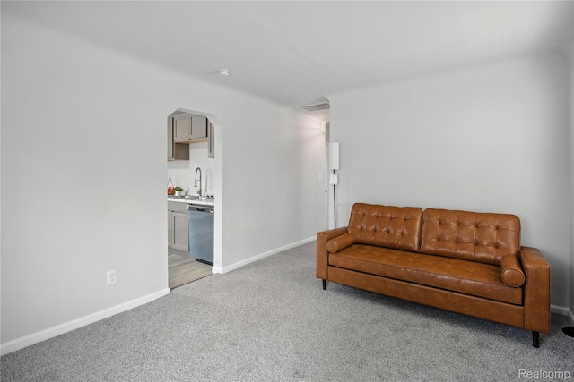 3887 Moore Ave, Allen Park, MI 48141 - living area with light colored carpet and arched walkways