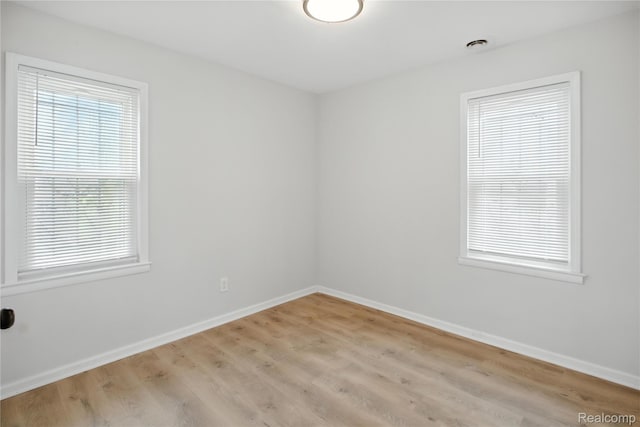 3887 Moore Ave, Allen Park, MI 48141 - spare room featuring wood finished floors