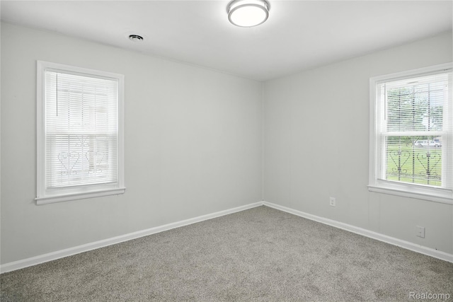3887 Moore Ave, Allen Park, MI 48141 - carpeted empty room featuring baseboards