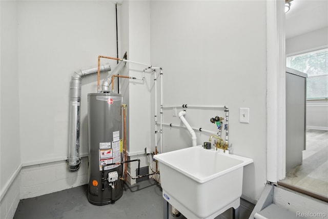 3887 Moore Ave, Allen Park, MI 48141 - utility room featuring water heater and a sink