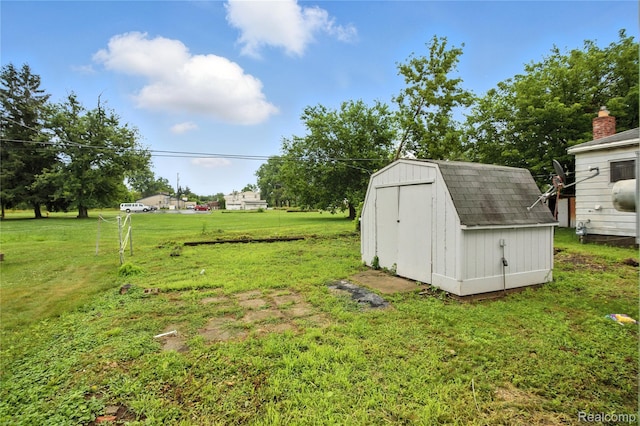 3887 Moore Ave, Allen Park, MI 48141 - view of green lawn featuring a shed
