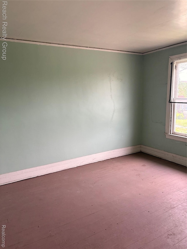 199 Waverly St, Highland Park, MI 48203 - unfurnished room with baseboards and crown molding