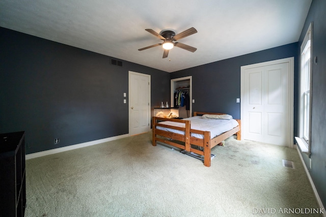 401 Erin Isle Ct, Holland, MI 49424 - bedroom with carpet floors and ceiling fan
