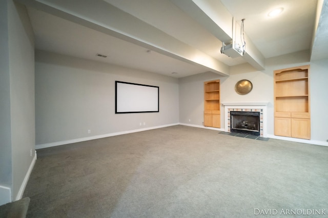 401 Erin Isle Ct, Holland, MI 49424 - cinema with dark carpet, a tile fireplace, built in features, and beam ceiling