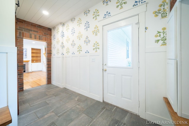 401 Erin Isle Ct, Holland, MI 49424 - entrance foyer with a wainscoted wall, a decorative wall, and recessed lighting