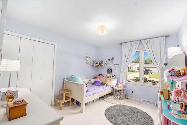 10850 Rajah Dr, Zeeland, MI 49464 - carpeted bedroom featuring a closet and baseboards