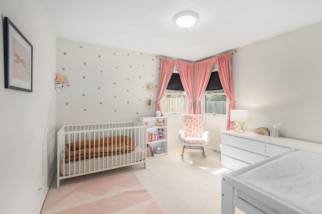 10850 Rajah Dr, Zeeland, MI 49464 - carpeted bedroom featuring a nursery area
