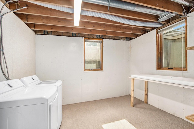 10850 Rajah Dr, Zeeland, MI 49464 - laundry room with independent washer and dryer and light colored carpet