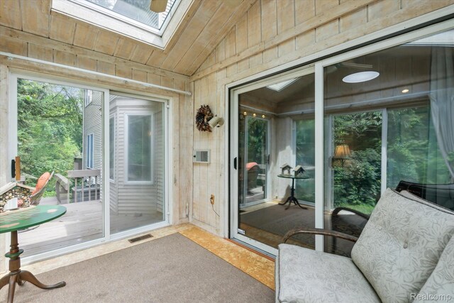 7740 Athlone Dr, Brighton, MI 48116 - sunroom featuring a skylight and vaulted ceiling