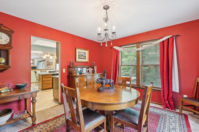 7740 Athlone Dr, Brighton, MI 48116 - dining area with a chandelier and light tile patterned floors