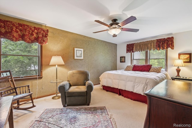 7740 Athlone Dr, Brighton, MI 48116 - bedroom with light colored carpet and a ceiling fan