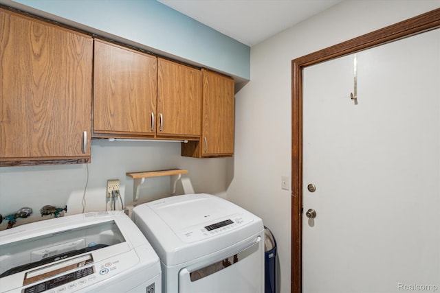 7740 Athlone Dr, Brighton, MI 48116 - laundry area featuring cabinet space and separate washer and dryer