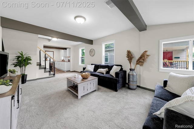 313 W Harwood Ave, Madison Heights, MI 48071 - living room featuring beam ceiling, stairway, and carpet floors