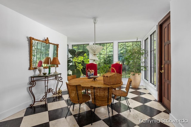1217 El Camino Dr NW, Grand Rapids, MI 49504 - dining room with baseboards and tile patterned floors