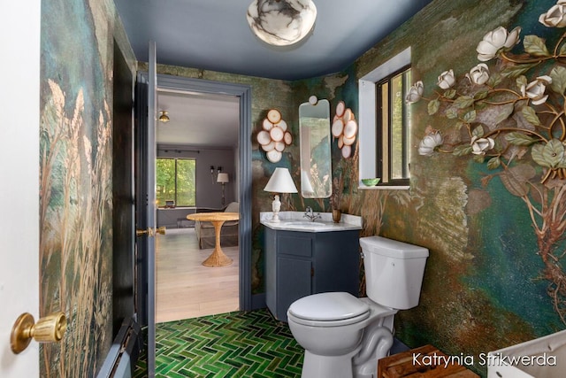 1217 El Camino Dr NW, Grand Rapids, MI 49504 - bathroom with vanity and brick patterned floors