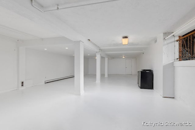 1217 El Camino Dr NW, Grand Rapids, MI 49504 - basement featuring baseboard heating and recessed lighting