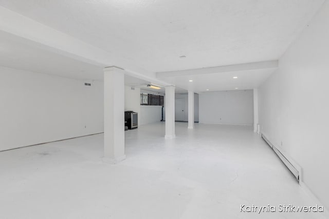 1217 El Camino Dr NW, Grand Rapids, MI 49504 - finished below grade area with a baseboard radiator and recessed lighting