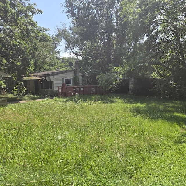 709 11th St, Three Rivers, MI 49093 - view of yard featuring a wooden deck