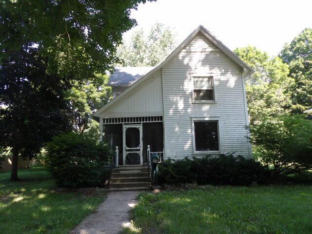 209 E High St, Union City, MI 49094 - victorian-style house featuring a sunroom