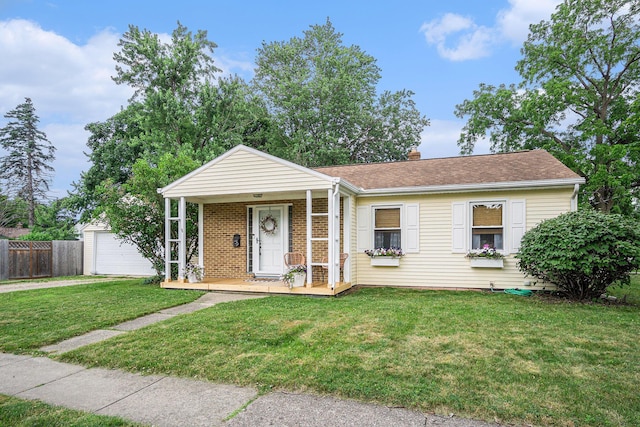 1805 Cambridge Dr, Kalamazoo, MI 49001 - view of front of home with a porch, a garage, a chimney, brick siding, and roof with shingles