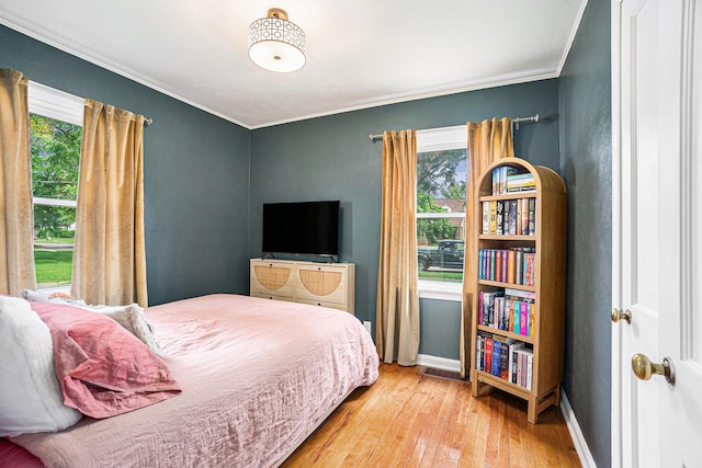 1805 Cambridge Dr, Kalamazoo, MI 49001 - bedroom with hardwood / wood-style flooring and ornamental molding