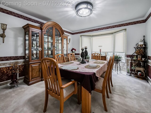 12495 Howland Park Dr, Plymouth, MI 48170 - dining space with light carpet, ornamental molding, and plenty of natural light