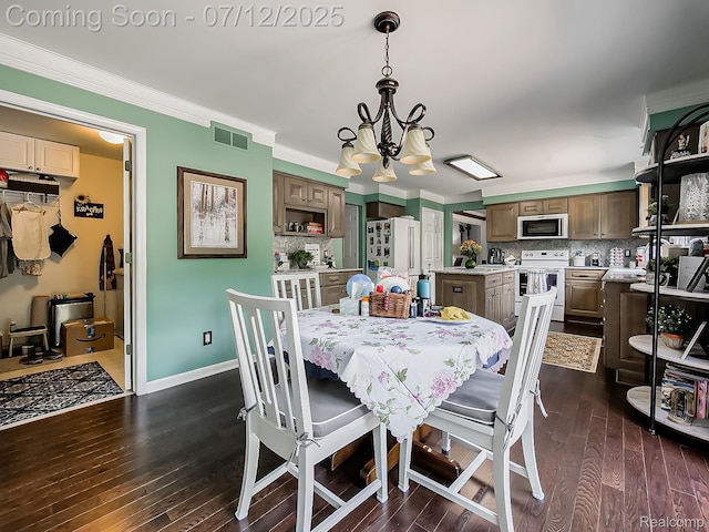 12495 Howland Park Dr, Plymouth, MI 48170 - dining space featuring dark wood-style flooring and crown molding