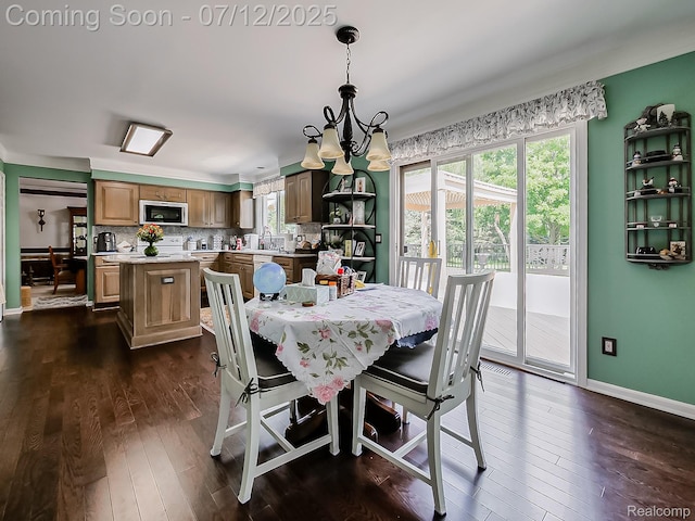 12495 Howland Park Dr, Plymouth, MI 48170 - dining room with dark wood-style flooring and baseboards