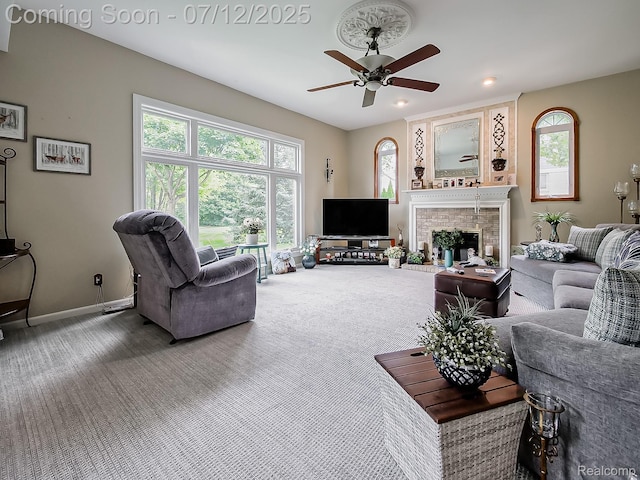 12495 Howland Park Dr, Plymouth, MI 48170 - living area featuring a ceiling fan, carpet flooring, a brick fireplace, and recessed lighting